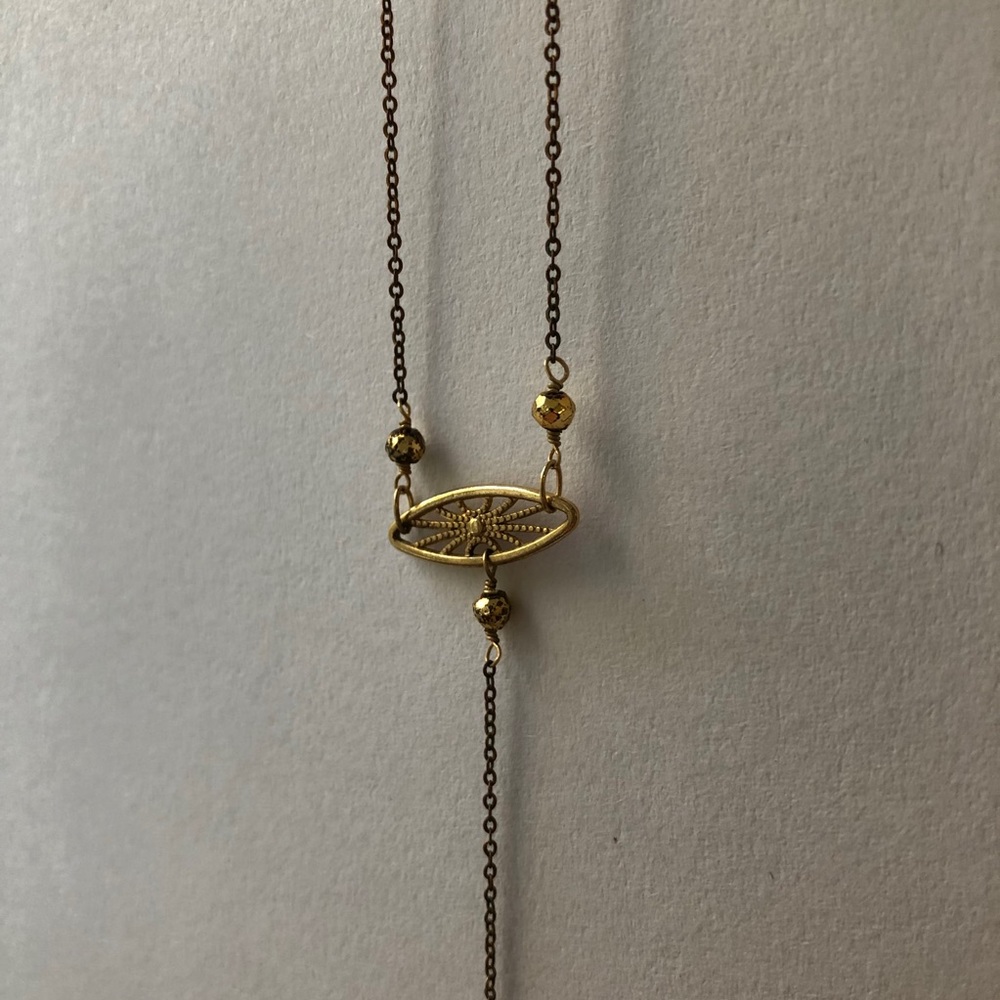 Delicate gold body chain